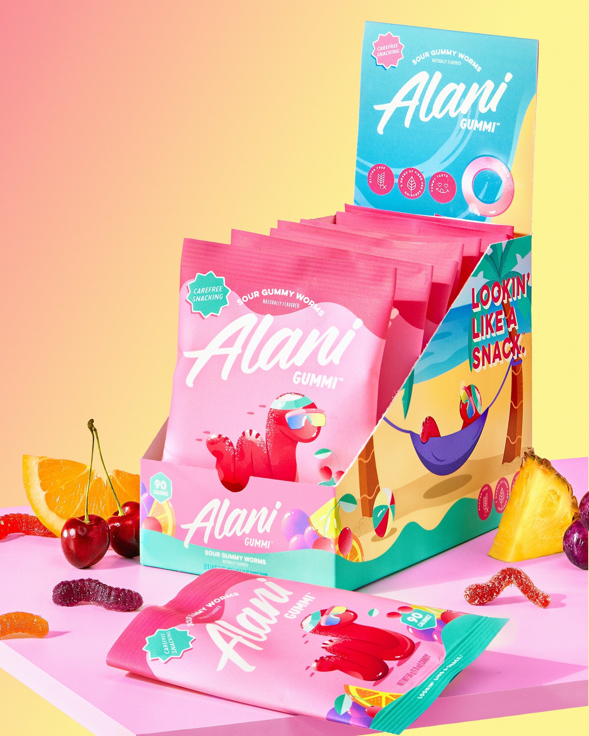 A cartoon of Sour Gummy Worms flavor snacks sitting on top of a table.